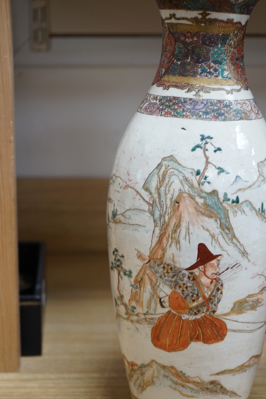 A pair of Japanese Satsuma ‘samurai’ vases, Meiji period, 40cm. Condition - poor to fair